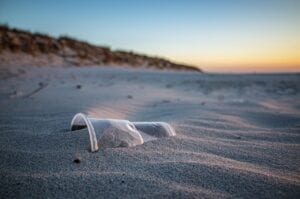 plastic cup on beach